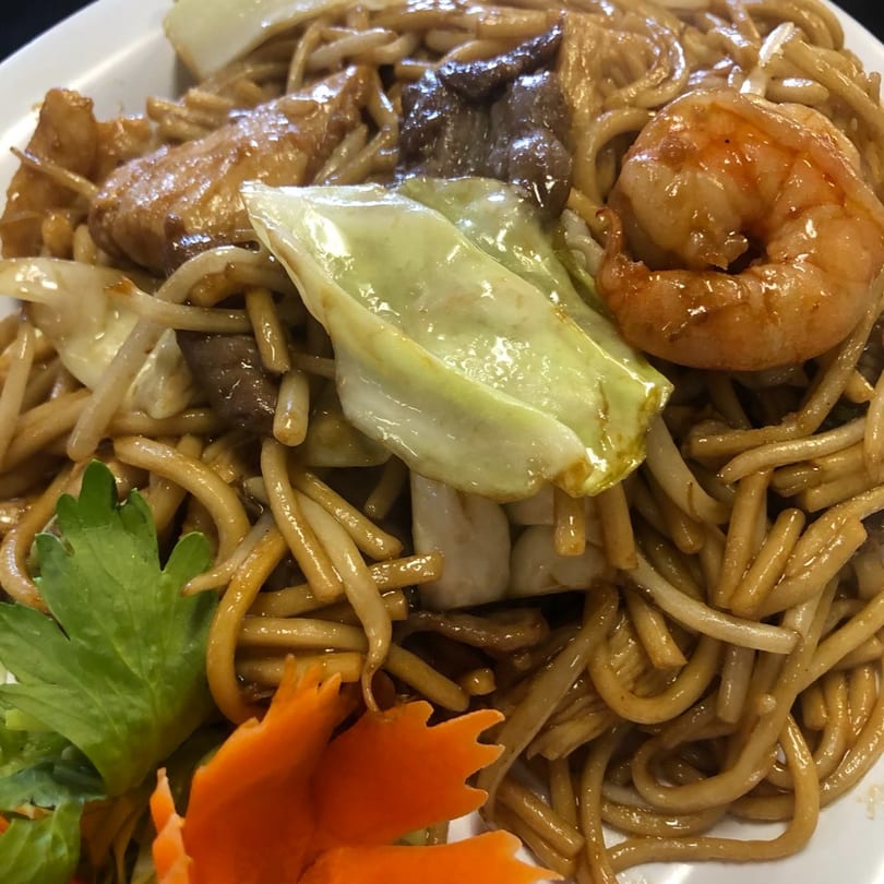 Mei Hon Chinese Restaurant's lo mein with shrimp, beef, chicken, cabbage, and decorative carrot.